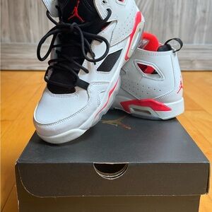 Nike White and Red Sneakers with Iconic Design